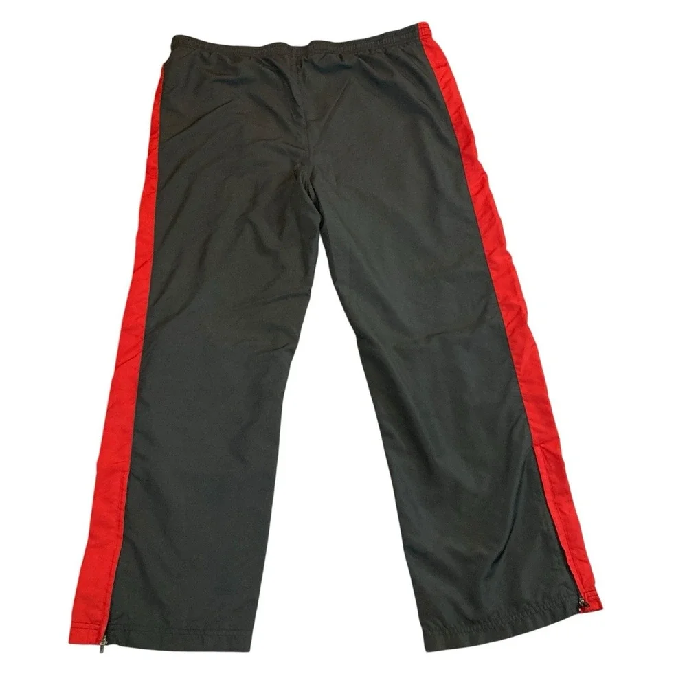 Under Armour Pants Men Medium M Windbreaker‎ Red Black Zip Ankles Stretch Track